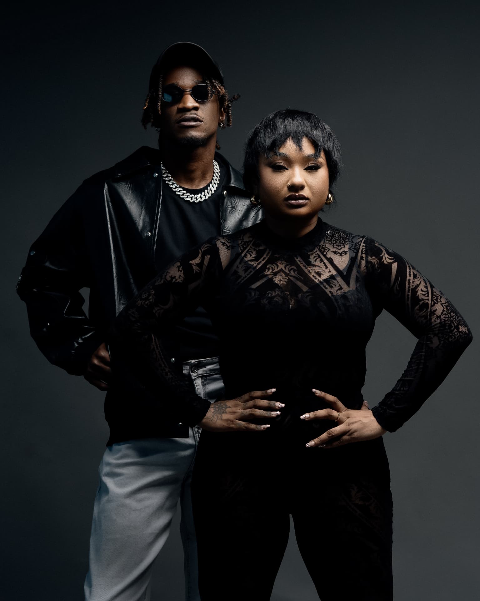 Aika & Nahreel in all black studio portrait